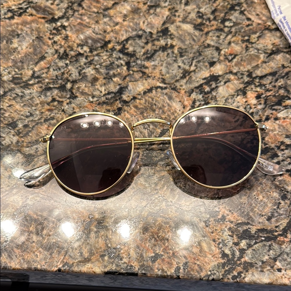 Round Gold Sunglasses with Dark Lenses